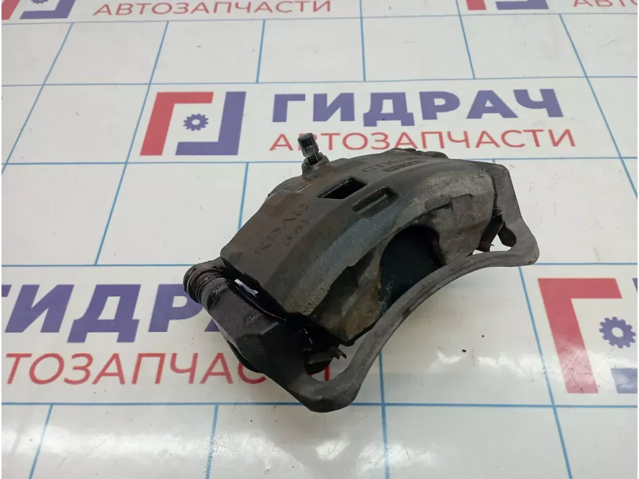 Суппорт тормозной передний левый Nissan Almera Classic (B10) 41011-95F0A